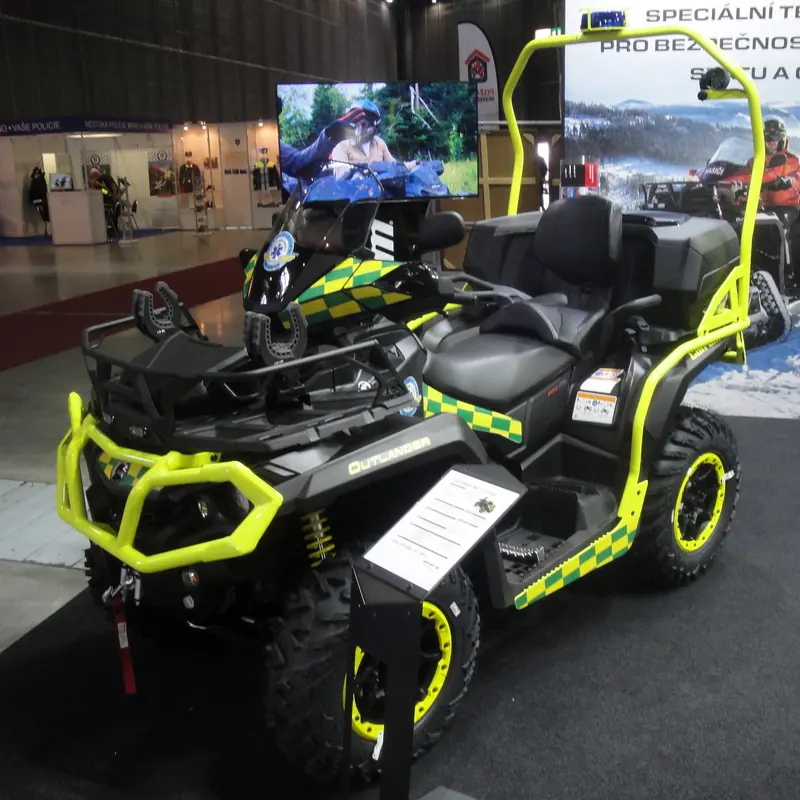 Can-Am Outlander MAX XT-P 1000R two-up ATV with lime-green accents and a passenger seat, on display at a 2019 trade show